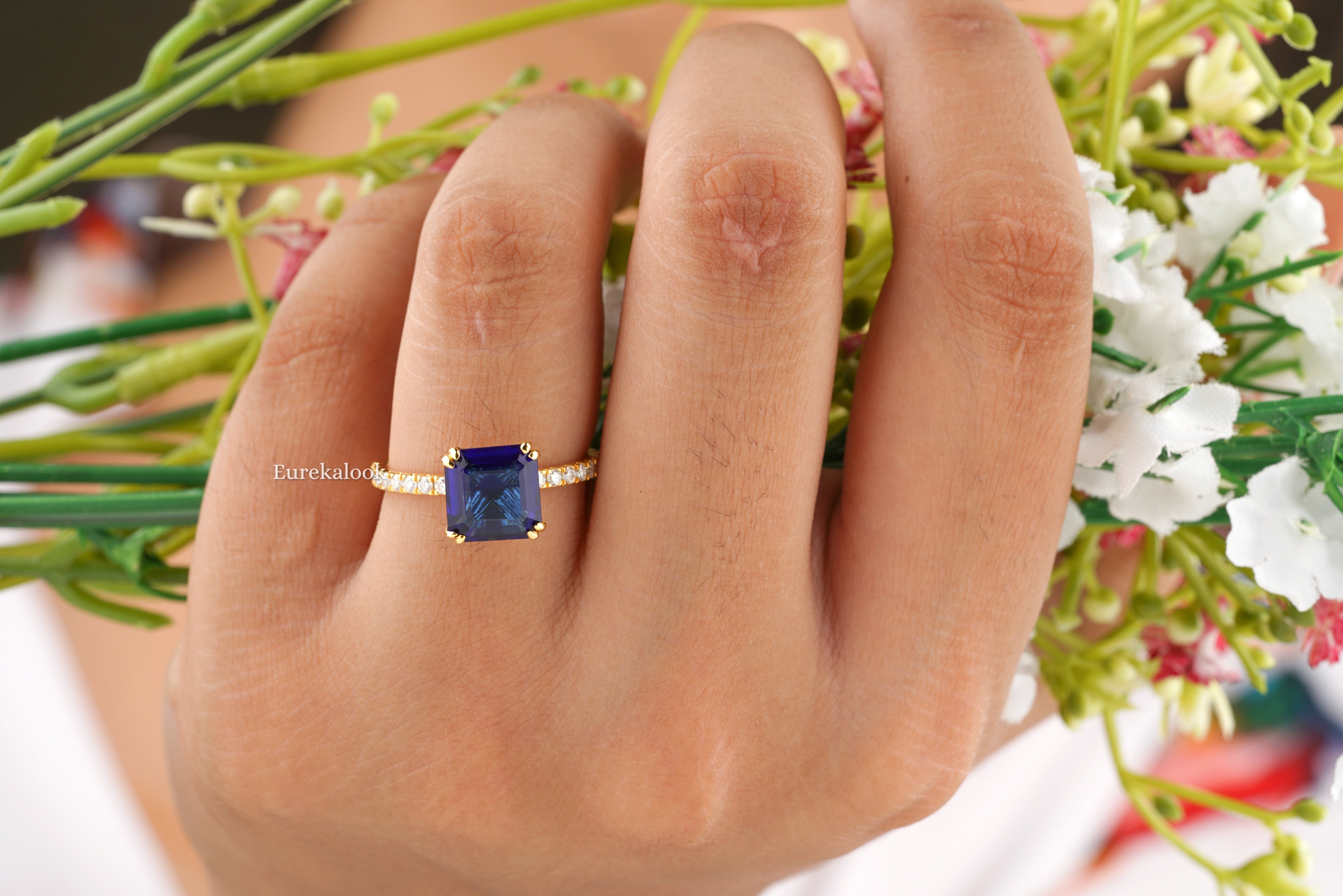 Eclat Jewels - One of a Kind Halo Ring with Cabochon Blue Sapphire Nat – AF  Jewelers